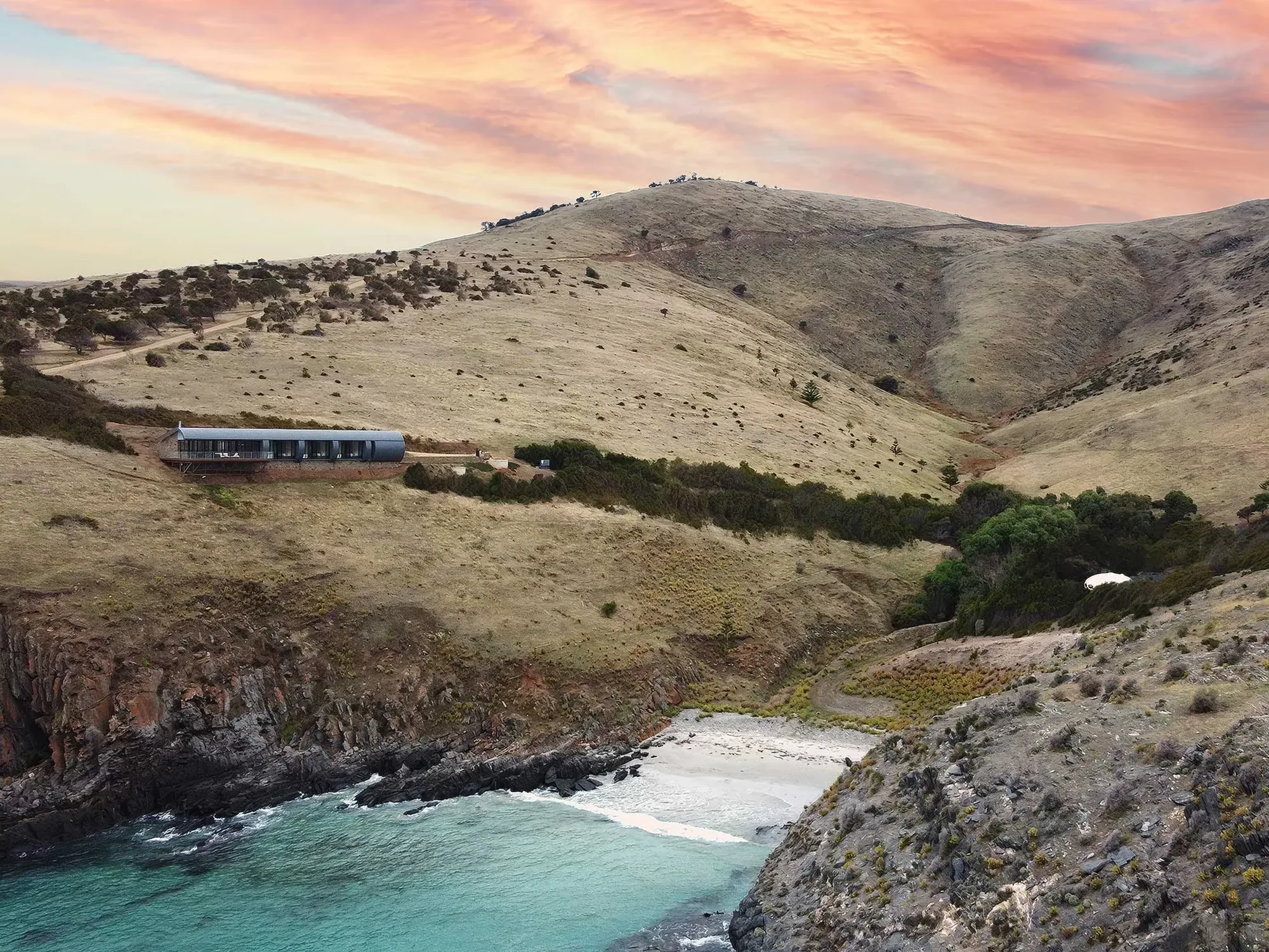Naiko's private beach and the surrounding hills from the air