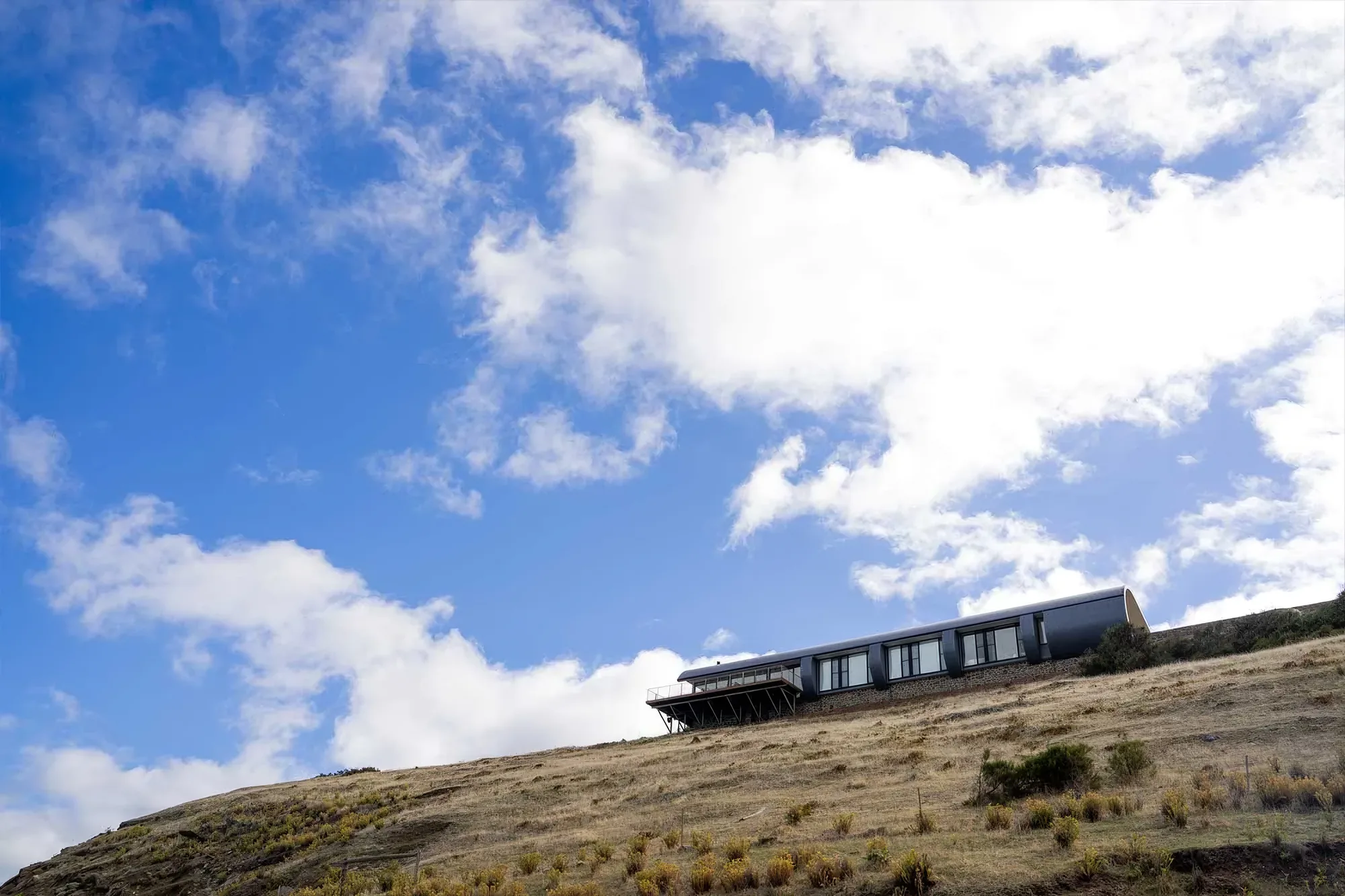 Naiko Retreat under a wide summer sky