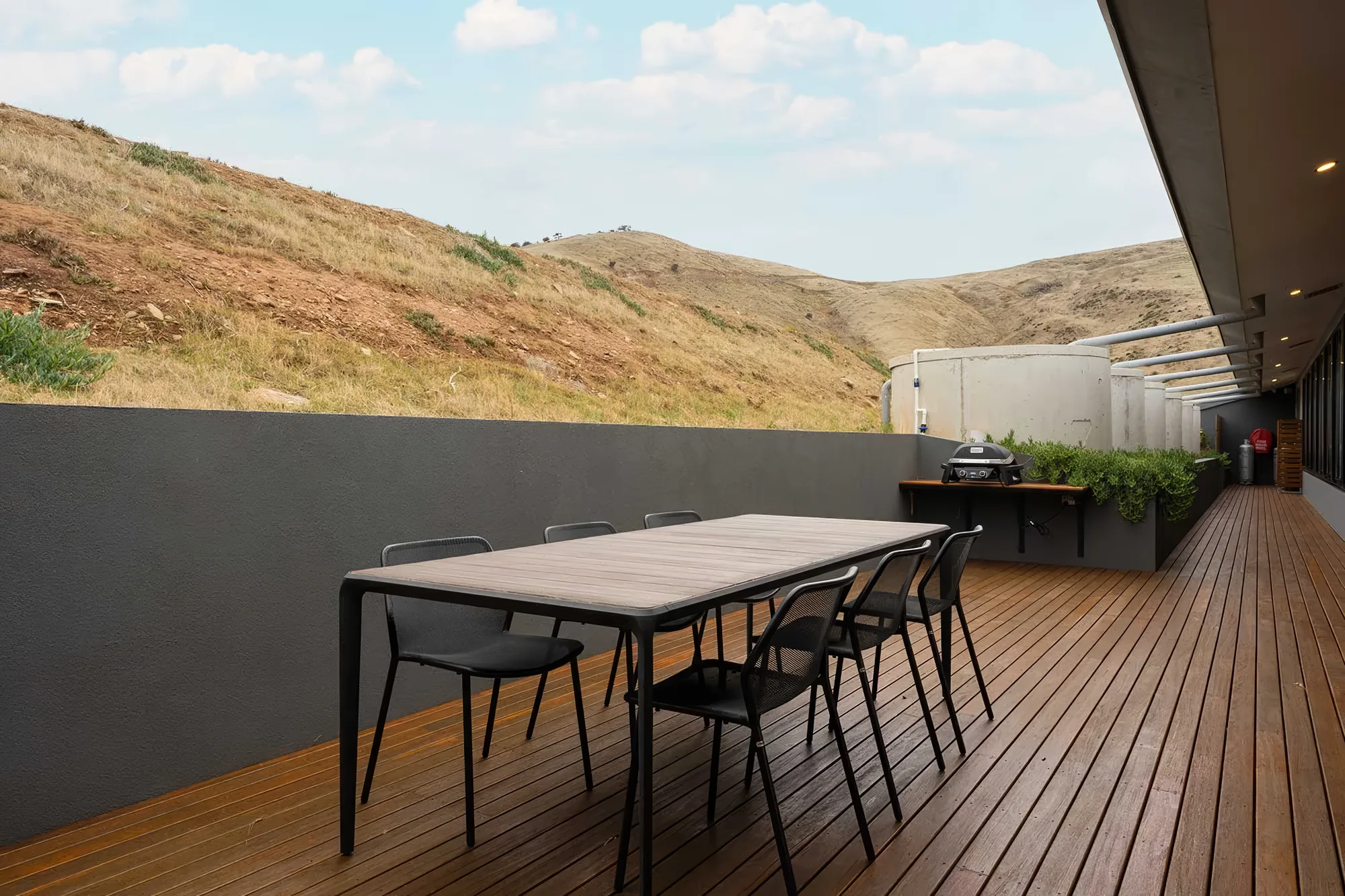 The sheltered rear courtyard set for alfresco dining