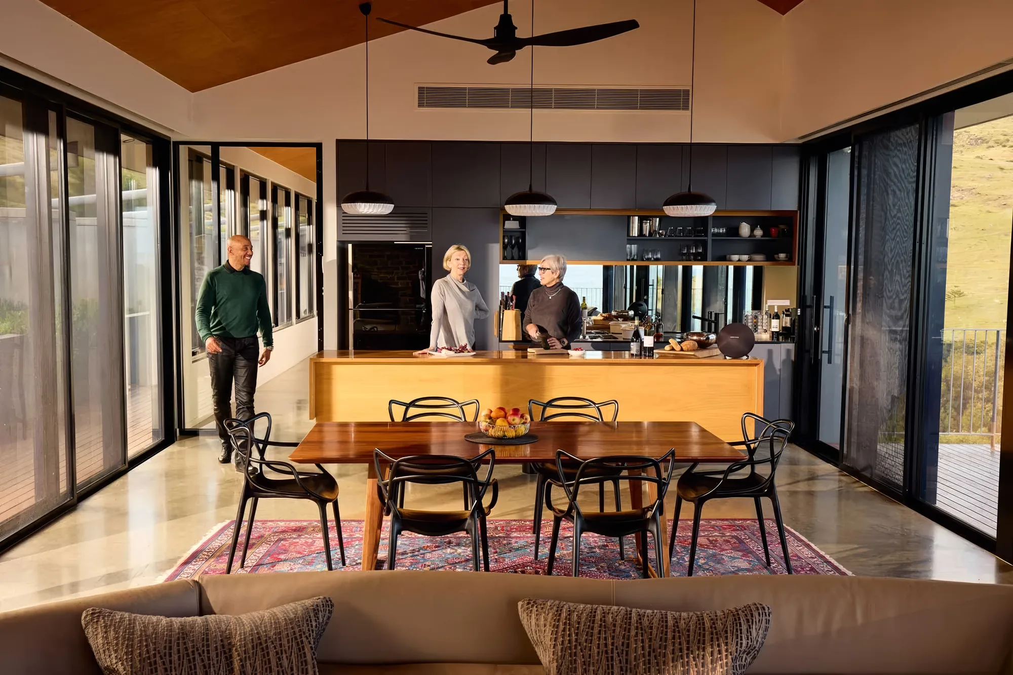 Guests in the gourmet kitchen at Naiko Retreat