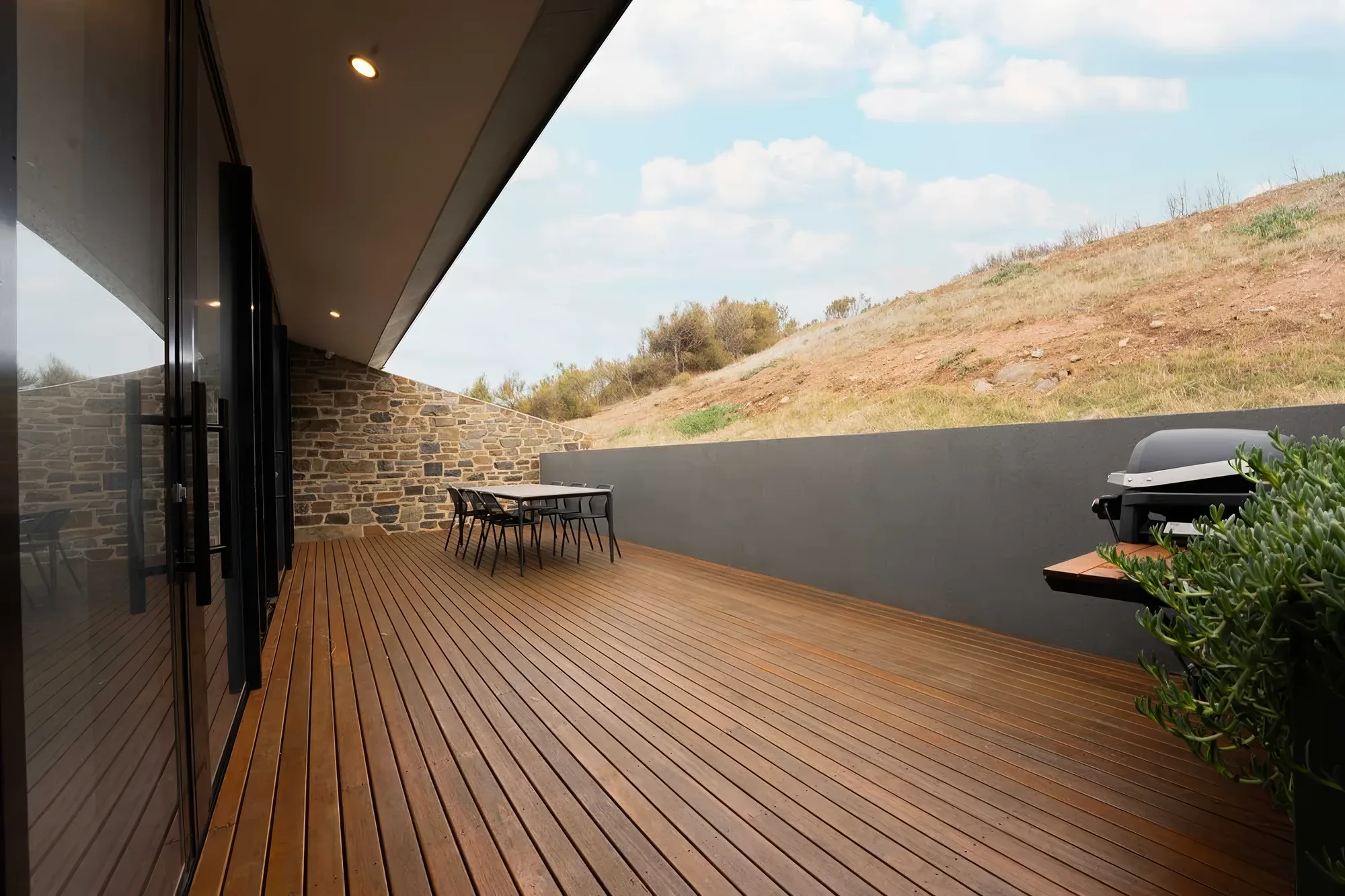 The rear terrace, protected from the onshore wind