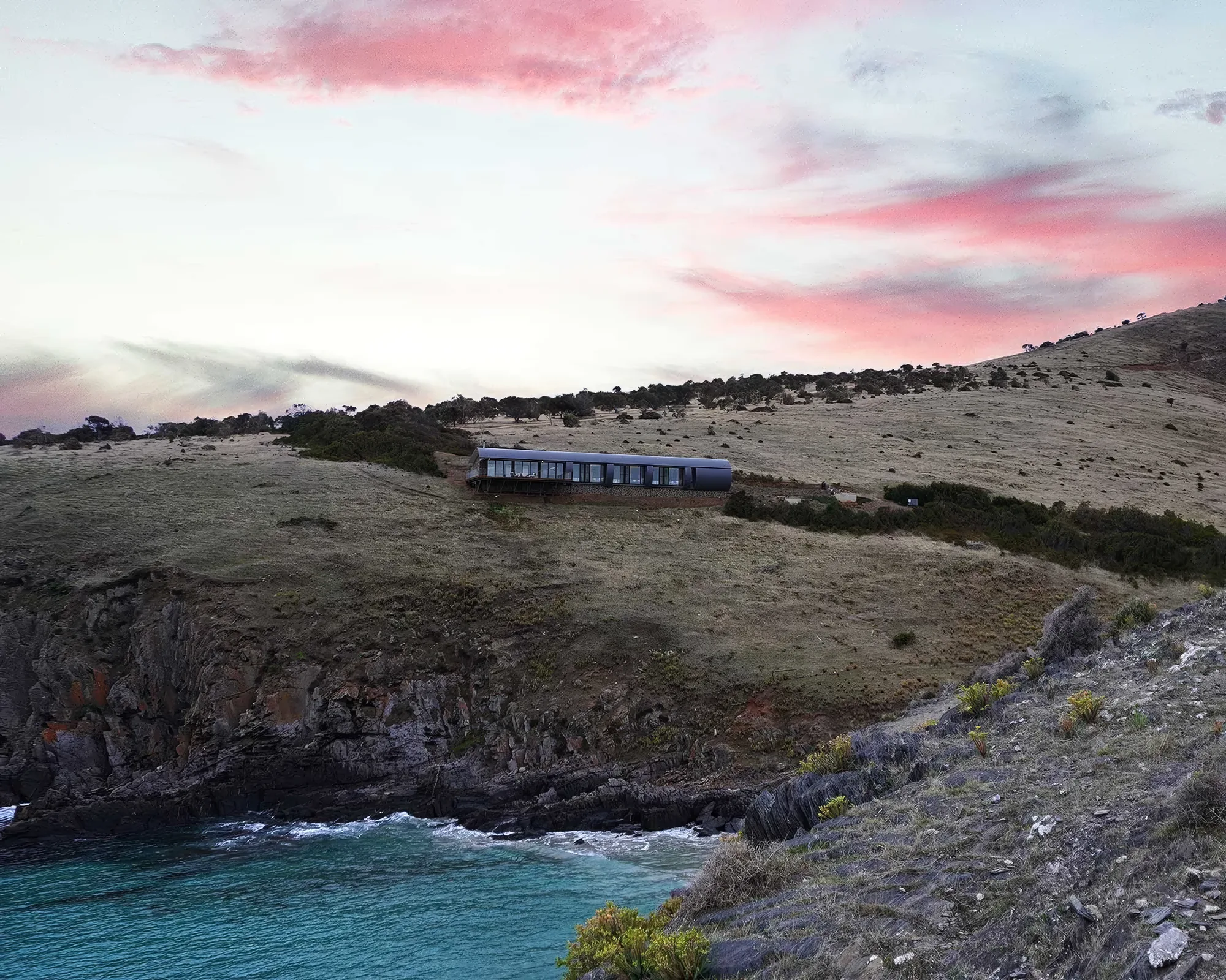 The retreat along its ridge at dusk with pink cloud over Backstairs Passage