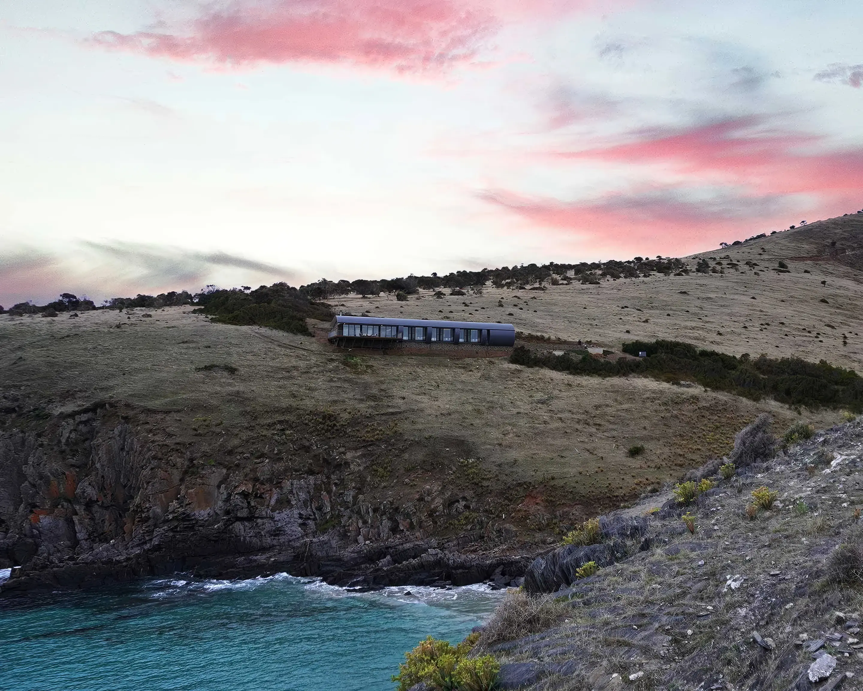 The retreat along its ridge at dusk with pink cloud over Backstairs Passage