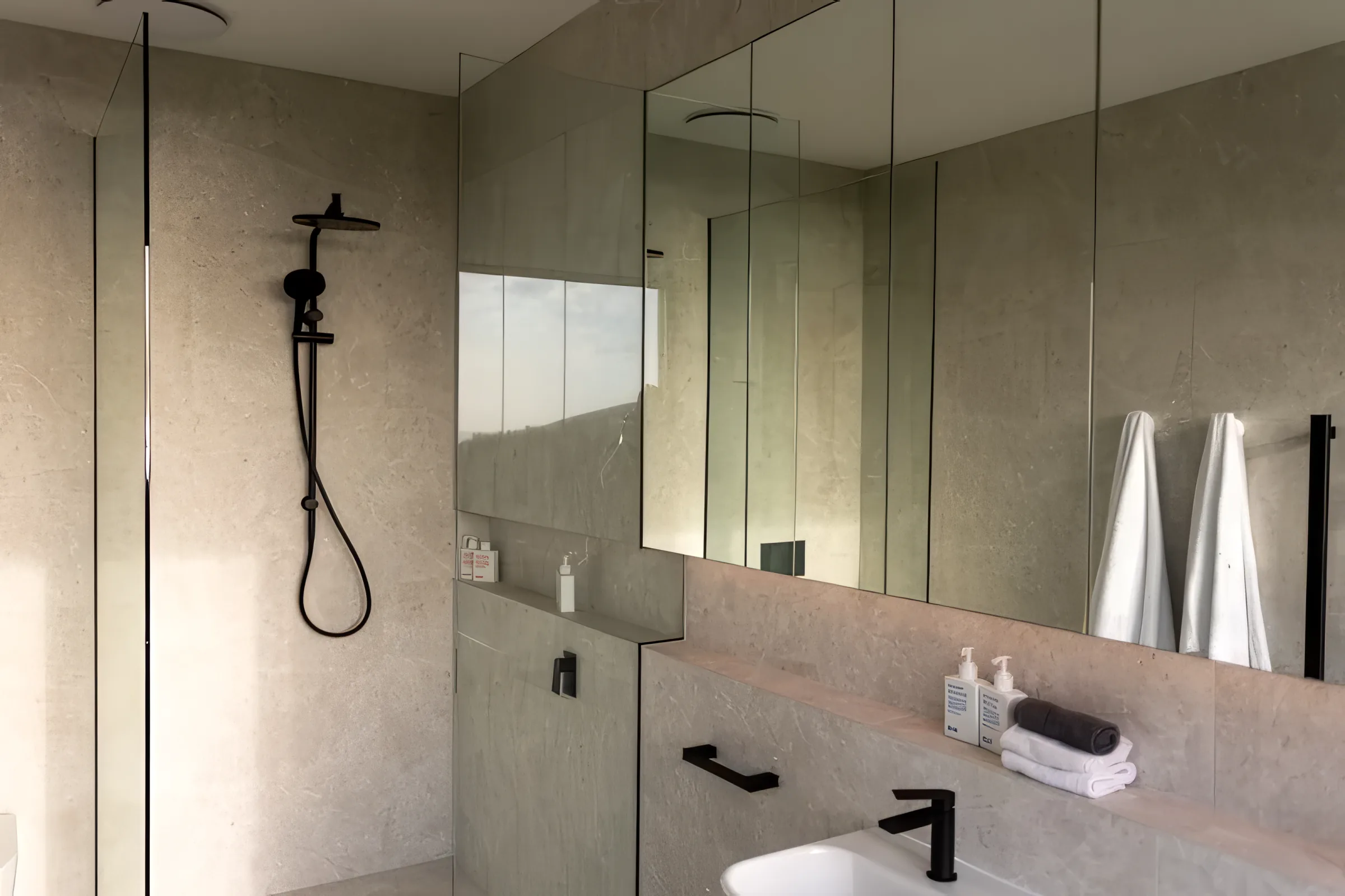 Walk-in shower and stone-toned ensuite