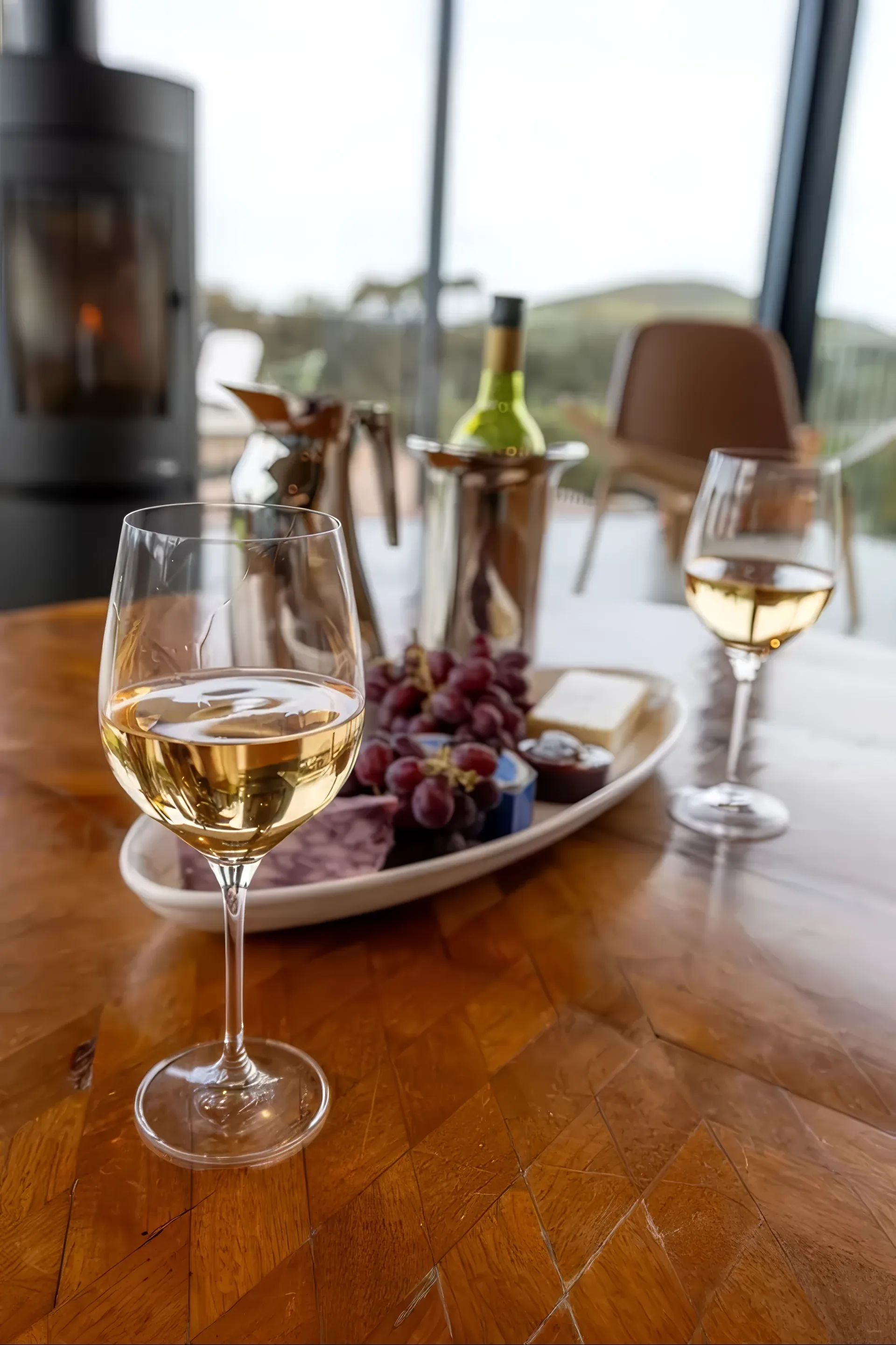 Wine poured at The Villa with the view beyond